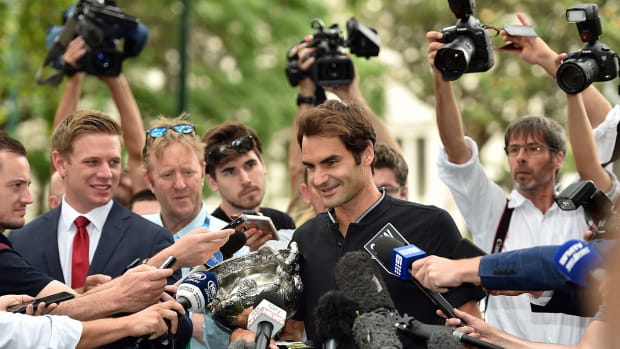 fed_talks_to_the_media_in_switz.jpg